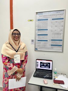Dr Nadirah with her student's poster